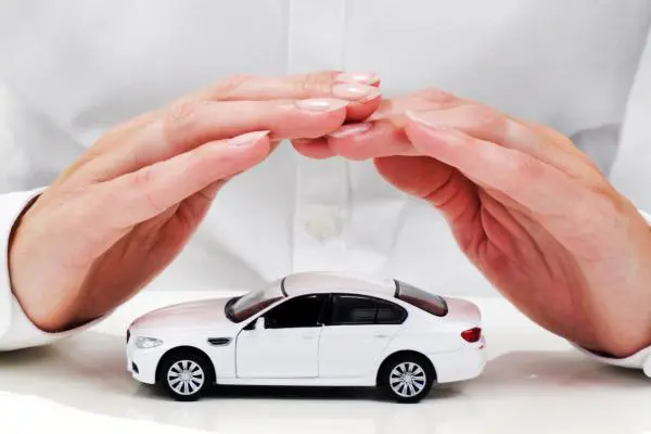 Carbon Collision Repair technician assisting with an insurance collision repair estimate in Antioch, Illinois